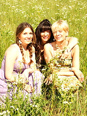 Old and young lesbians playing at the nature