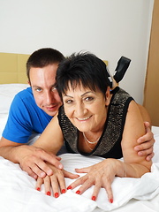 Naughty mature lady having fun with her toy boy